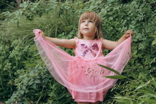 A young participant stands outdoors during the Kid Friendly Summer Lab in Odesa, Ukraine.