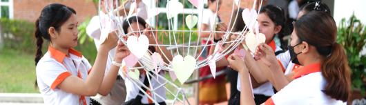 Students from diverse groups created Peace Symbols during the International Day of Peace. 