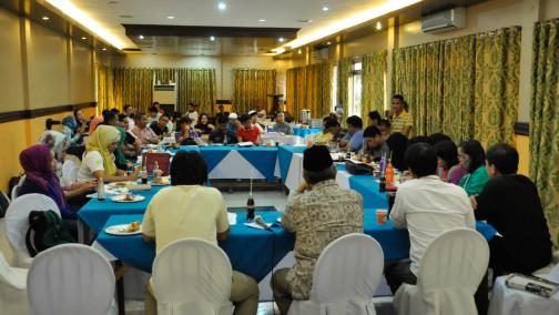 Discussion group seated at a round table