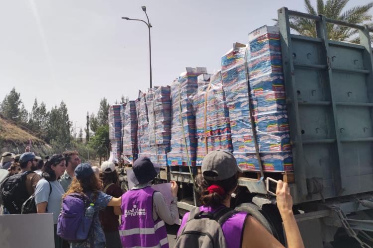 Activists of Standing Together gathered to protect the passage of aid convoys headed to Gaza