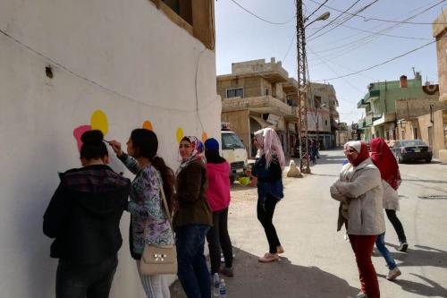 People painting the walls