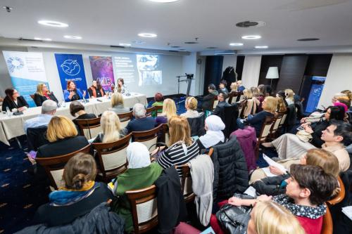 A panel conversation takes place.