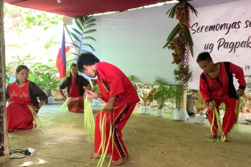 Manobo youth perform an indigenous dance during the ceremony