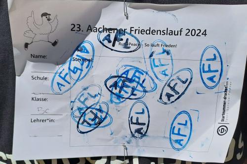 Stempelzettel eines Kindes vom 23. Aachener Friedenslauf