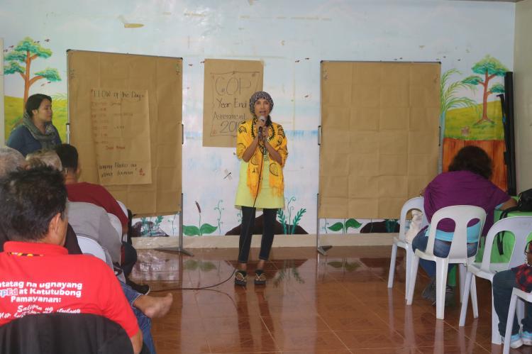 Bae Becky Barrios speaks at a forumZFD project activity. 