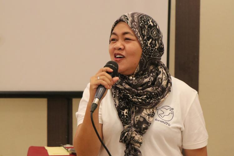 Jehan Usop speaks at a Pro Peace activity. 