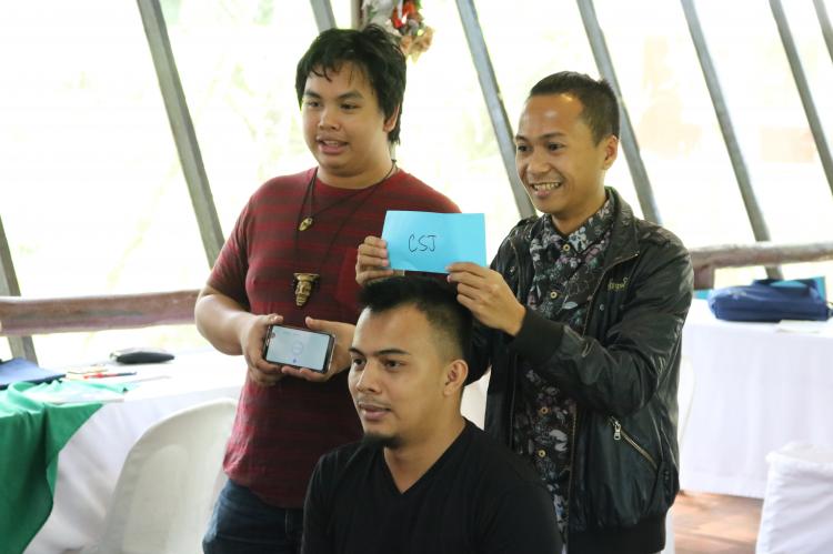Participants explaining CSJ in an exercise of the training