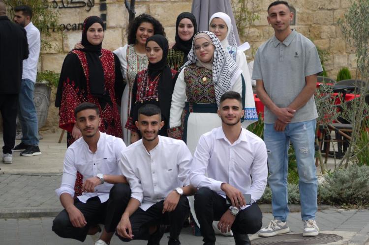 young artists standing together in the exhibition
