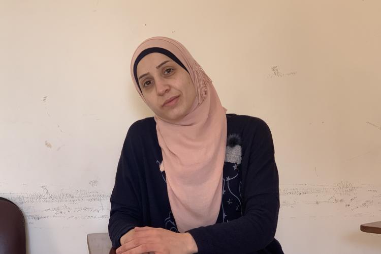 Portrait of women wearing black top and light pink hijab 