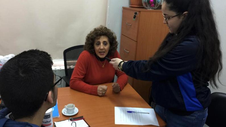 Two students conducting an interview
