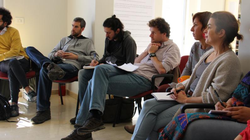 Group discussion, participants taking notes