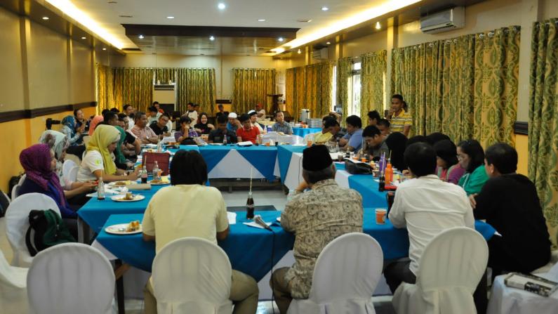 Discussion group seated at a round table