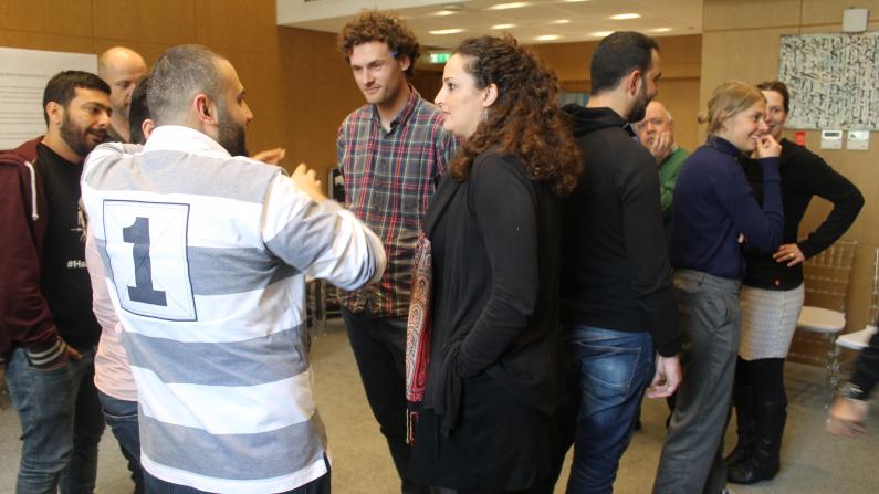 Group of people engaged in discussion 