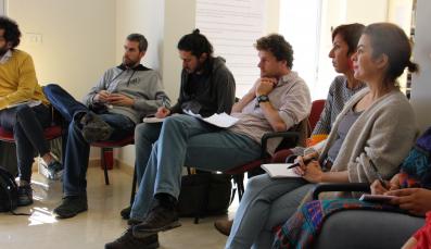 Group discussion, participants taking notes