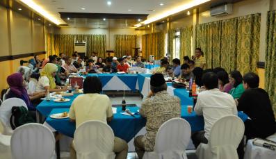 Discussion group seated at a round table