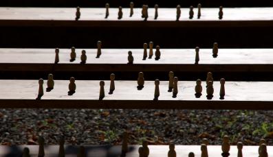 small wood figures on steps