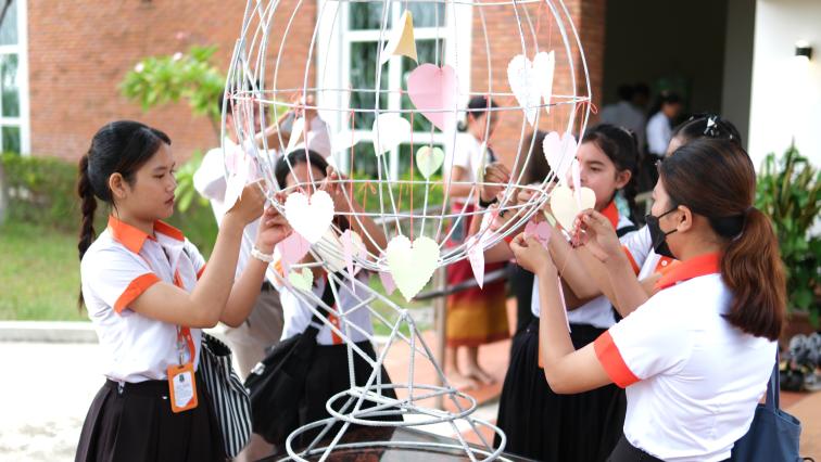 Students from diverse groups created Peace Symbols during the International Day of Peace. 